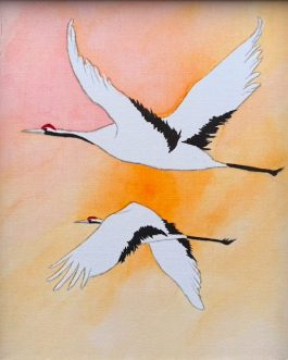 Kraanvogels in de ochtendzon